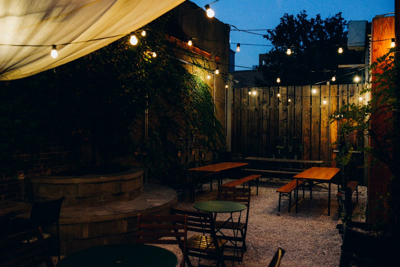 Commercial outdoor seating with overhead string lights
